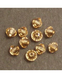  Swarovski® 4mm Light Colorado Topaz Bicone Xilion Cut Beads (Pack of 10)